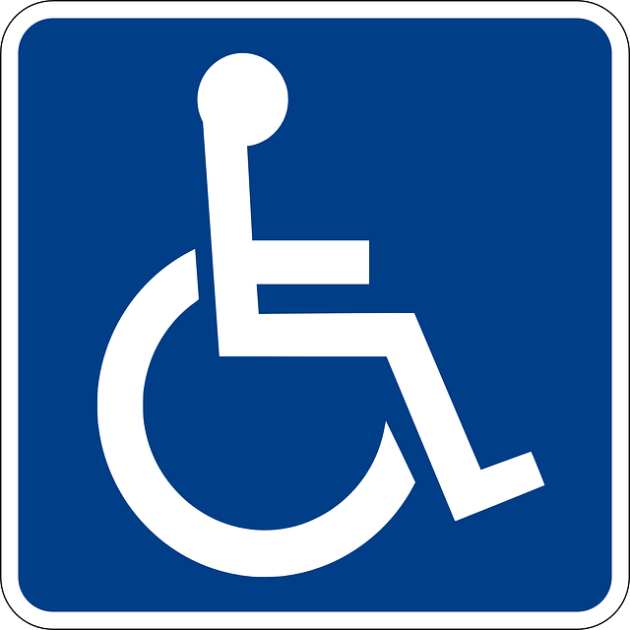 A white symbol of a person in a wheelchair appears on a square blue background.